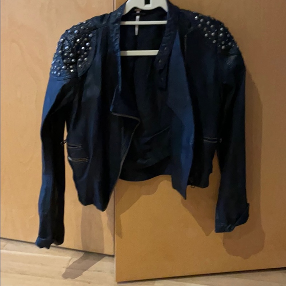 Leather jacket with studs and multicolor design